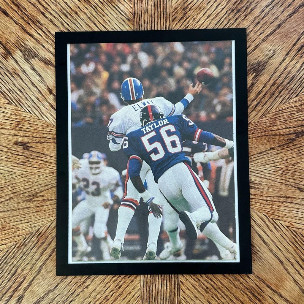 1987 Vintage Elway vs Lawrence Taylor NFL Action Framed Editorial Photo Print