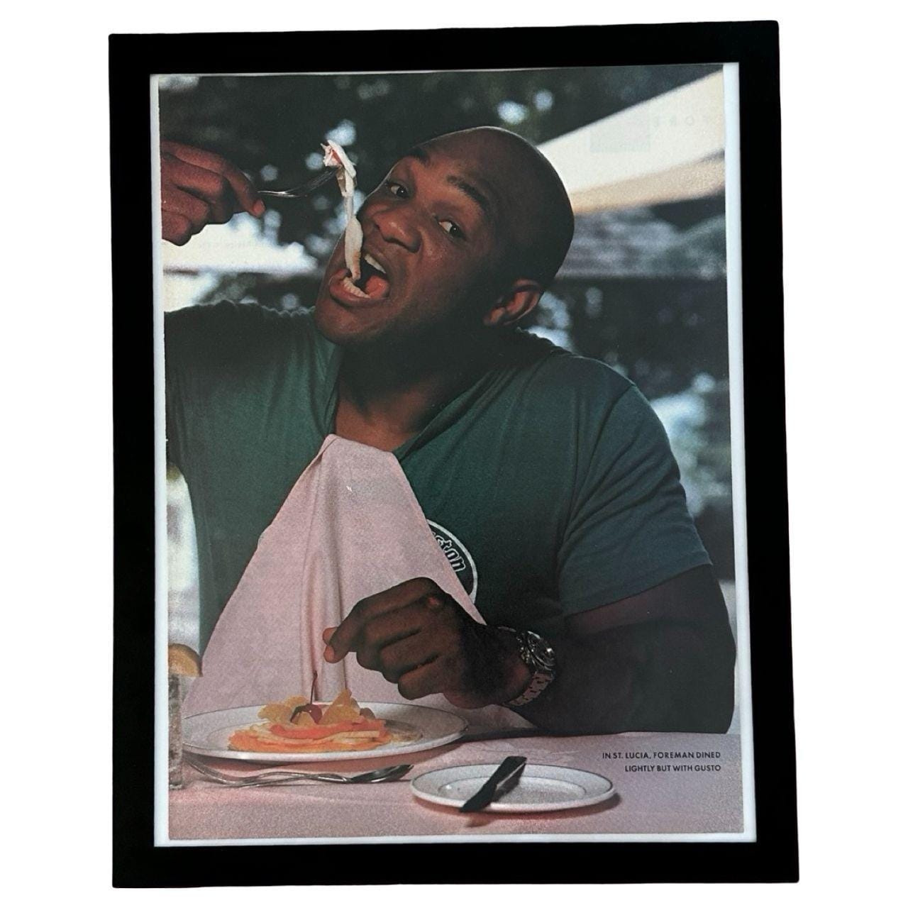 George Foreman Dining in St Lucia Sports Illustrated Editorial Photo