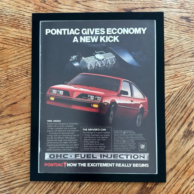 Pontiac J2000 1982 Economy A New Kick OHC Fuel Injection Framed Vintage Magazine Ad - detail view